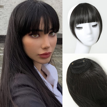 Clip-in fringe hairpiece showing the clip attachment and texture